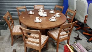 ANTIQUE CIRCULAR DINING TABLE AND 6 REPRO CHAIRS