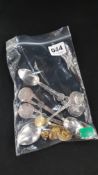 5 SOLID SILVER SPOONS AND RUC BADGES