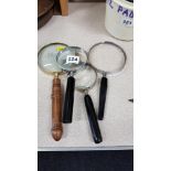 4 MAGNIFYING GLASSES
