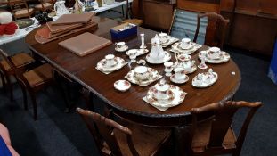 ANTIQUE EXTENDING DINING TABLE AND 6 CHAIRS