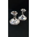 PAIR OF SILVER CANDLESTICKS