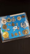 SHEET OF ARMY, NAVY AND AIR FORCE BADGES