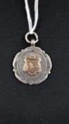 ANTIQUE SILVER SWIMMING MEDAL