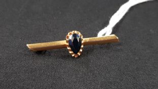 VERY COLLECTABLE 22 CARAT SAPPHIRE BROOCH (CHINESE STAMPS)