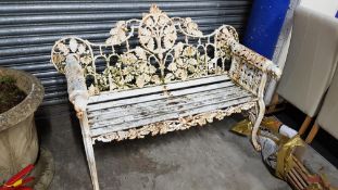 ANTIQUE CAST IRON GARDEN SEAT IN THE STYLE OF COALBROOKDALE