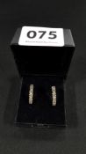 PAIR 9 CARAT GOLD AND EMERALD EARRINGS (NO BACKS)