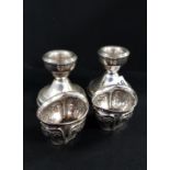 PAIR OF SILVER CANDLESTICKS AND SILVER SALTS