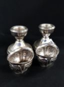 PAIR OF SILVER CANDLESTICKS AND SILVER SALTS