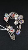 SILVER CHARM BRACELET WITH SILVER AND ENAMEL CHARMS