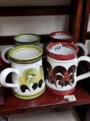 4 MID CENTURY DENBY TANKARDS