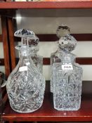 4 HEAVY CUT CRYSTAL DECANTERS