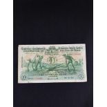 BANKNOTE - THE NATIONAL BANK £1/PUNT 'PLOUGHMAN' 14.2.35