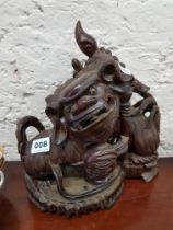 PAIR OF ANTIQUE CARVED DOGS FOO