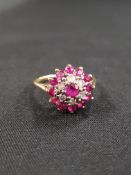 18 CARAT GOLD RUBY AND DIAMOND CLUSTER RING