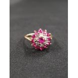 18 CARAT GOLD RUBY AND DIAMOND CLUSTER RING