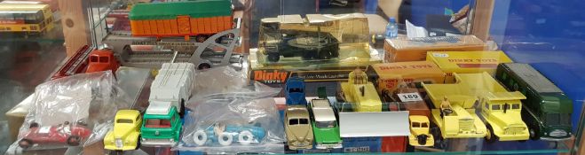 SHELF LOT OF DINKY MODELS