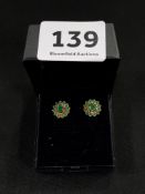 PAIR OF 9 CARAT GOLD EMERALD EARRINGS