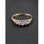 18 CARAT GOLD AND DIAMOND 5 STONE RING (1 REPLACEMENT STONE NOT DIAMOND)