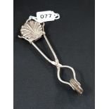 ANTIQUE ORNATE SKIRT LIFTER