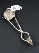 ANTIQUE ORNATE SKIRT LIFTER