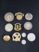 BAG OF SILVER COINS AND MILITARY BADGES