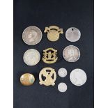 BAG OF SILVER COINS AND MILITARY BADGES