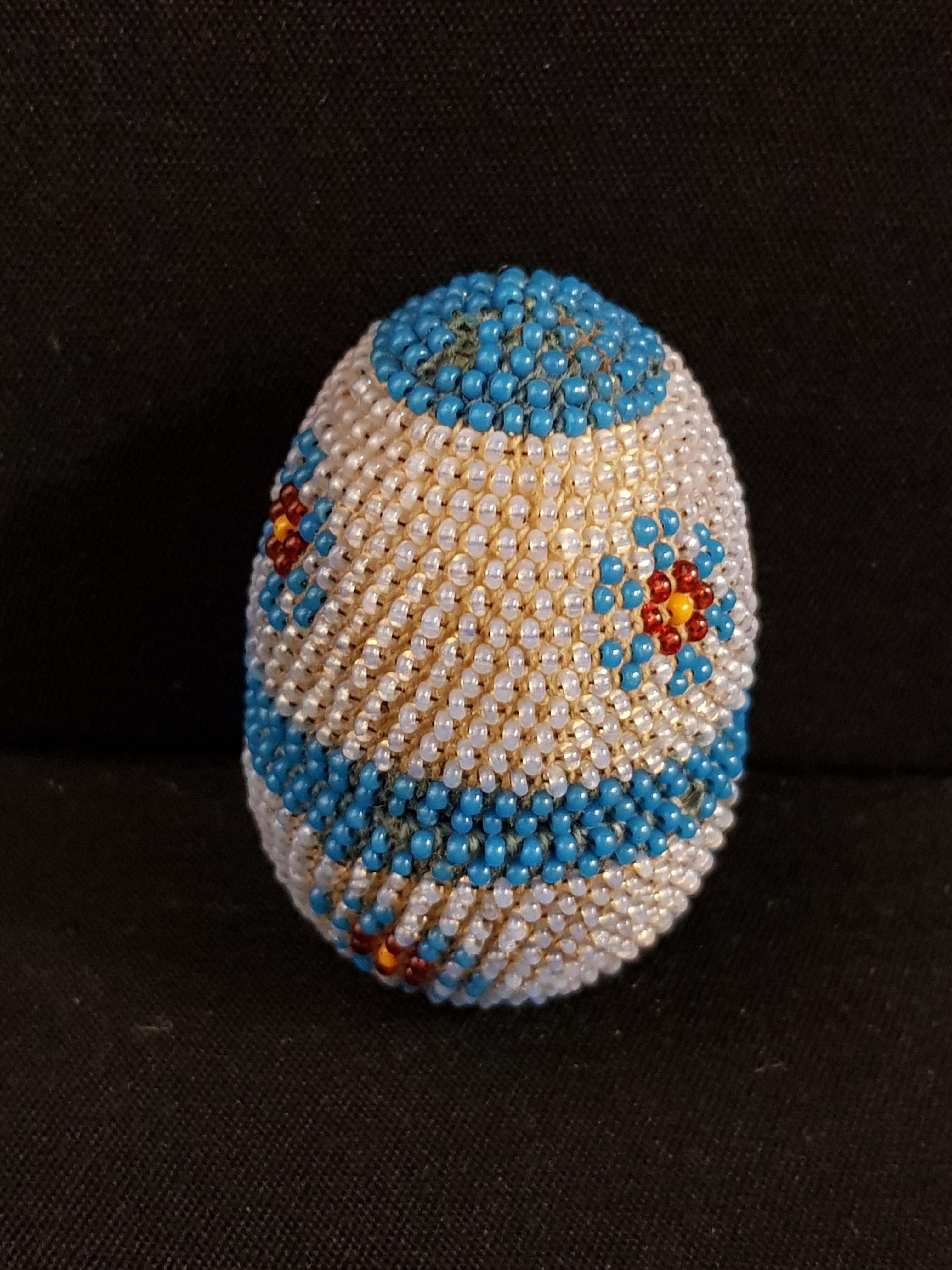 UNIQUE IVORY BEADED EGG, OPEN TO REVEAL IVORY CHALAISES AND 2 CUP AND SAUCERS