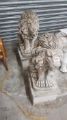 PAIR OF STONE GARDEN LION FIGURES