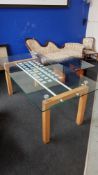 HEAVY DESIGNER GLASS TOPPED KITCHEN TABLE ON SOLID BEECH LEGS APPROX 6FT X 3 FT