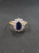 18 CARAT GOLD DIAMOND & SAPPHIRE RING