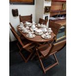 WOODEN PATIO TABLE AND 6 CHAIRS