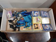 QUANTITY OF POKEMON CARDS AND ACTION FIGURES
