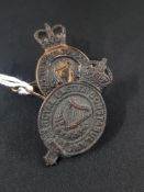 2 ANTIQUE RUC/ROYAL ULSTER CONSTABULARY HELMET BADGES, ONE KINGS BADGE
