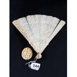 19TH CENTURY CARVED IVORY FAN AND DISC