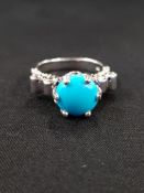 UNUSUAL SILVER TURQUOISE AND STONE RING