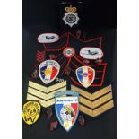 BAG OF VARIOUS ROYAL ULSTER CONSTABULARY/RUC & OTHER POLICE PATCHES, COLLAR DOGS AND PIPS