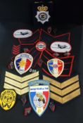 BAG OF VARIOUS ROYAL ULSTER CONSTABULARY/RUC & OTHER POLICE PATCHES, COLLAR DOGS AND PIPS