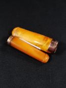 2 GOLD AND AMBER CIGAR HOLDERS