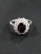 18 CARAT WHITE GOLD DIAMOND & SAPPHIRE RING WITH HINGED SHANK