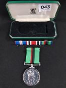 ROYAL ULSTER CONSTABULARY SERVICE MEDAL R/CONST S MCLOSKEY R13463