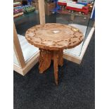 CARVED FOLDING PLANT TABLE