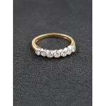 18 CARAT GOLD 7 STONE DIAMOND RING