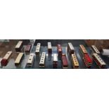 SHELF LOT OF WHITE METAL MODEL BUSES