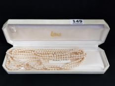 LARGE STRAND OF LOTUS PEARLS IN ORIGINAL BOX