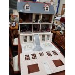 LARGE DOLLS HOUSE WITH FURNITURE AND WIRED FOR ELECTRIC