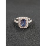 18 CARAT WHITE GOLD AND DIAMOND BLUE TOPAZ RING