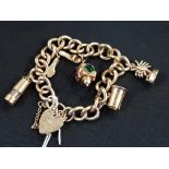 9 CARAT GOLD CHARM BRACELET & CHARMS CIRCA 30.7GRAMS