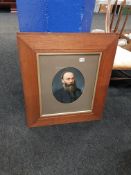 PAIR OF ANTIQUE UNSIGNED PORTRAITS IN OAK FRAMES