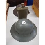 2 MILITARY TIN HELMETS AND WATER BOTTLE