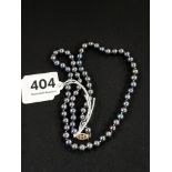 14 CARAT GOLD CLASP BLACK FRESHWATER PEARLS